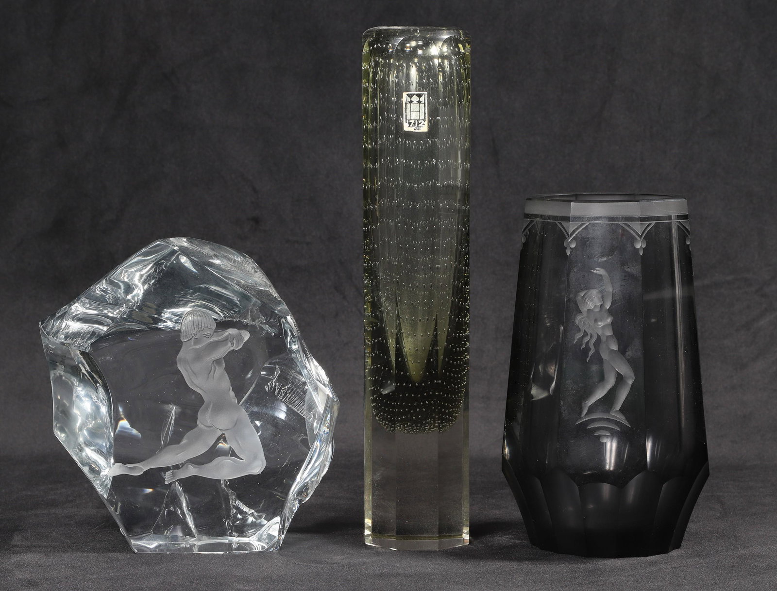 Elme Vase and Etched Glass Sculpture: Elme vase and etched glass sculpture to include smokey octagonal nude etched vase, signed W. 229 Elme at underside, 7-1/2"H and Swedish style etched nude male decorated sculpture, unsigned, 6-5/8"H, a
