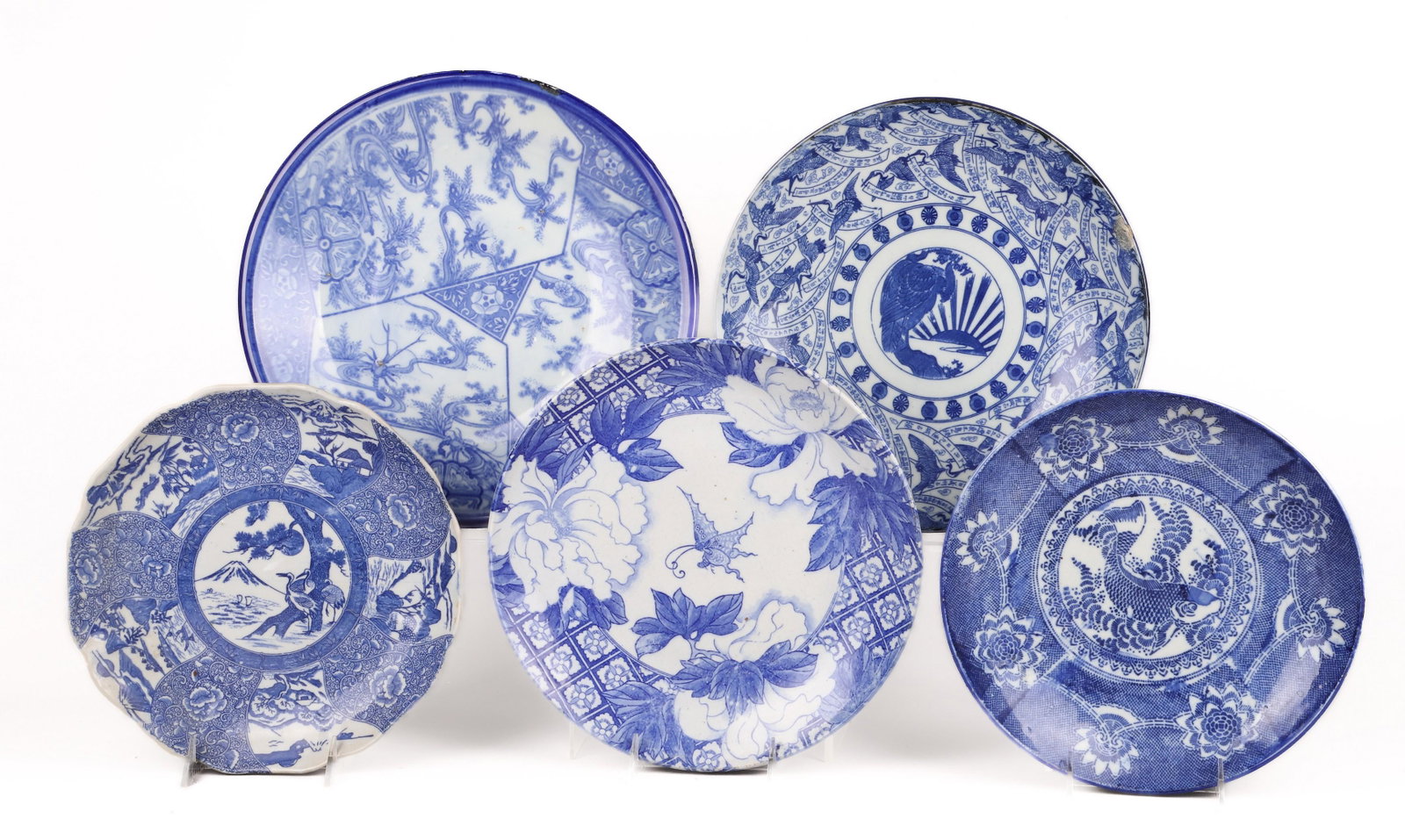 (5) Japanese Blue & White Porcelain Chargers: (5) Japanese blue & white porcelain chargers, c/o koi fish center with floral border (10-3/8" dia), cranes in landscape with volcano (10-3/8" dia), butterfly & floral decoration (11-3/4" dia), floral 