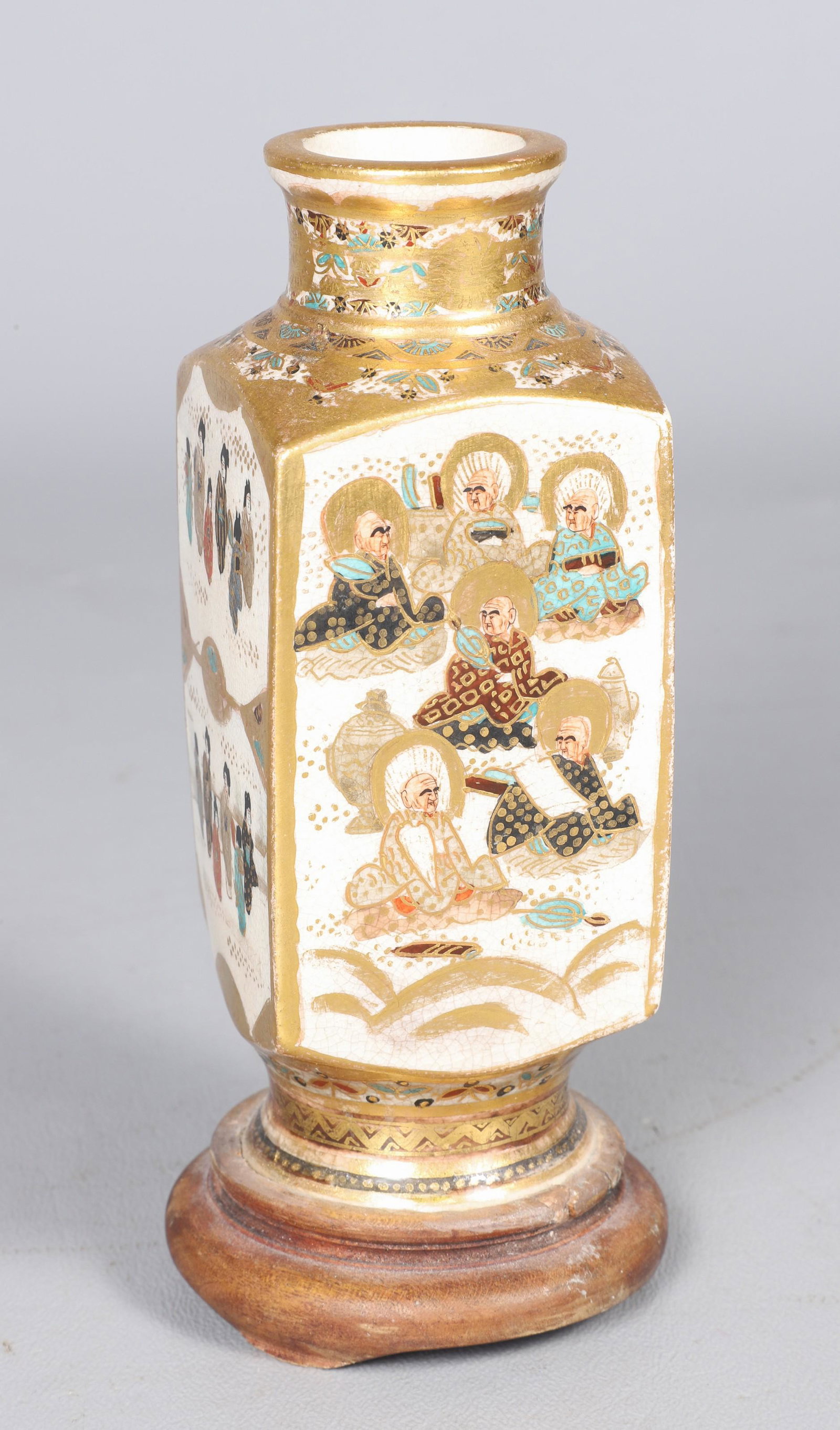 Japanese Satsuma Vase: Japanese Satsuma vase, Immortals decoration, on attached carved wood base, 5-1/2" h