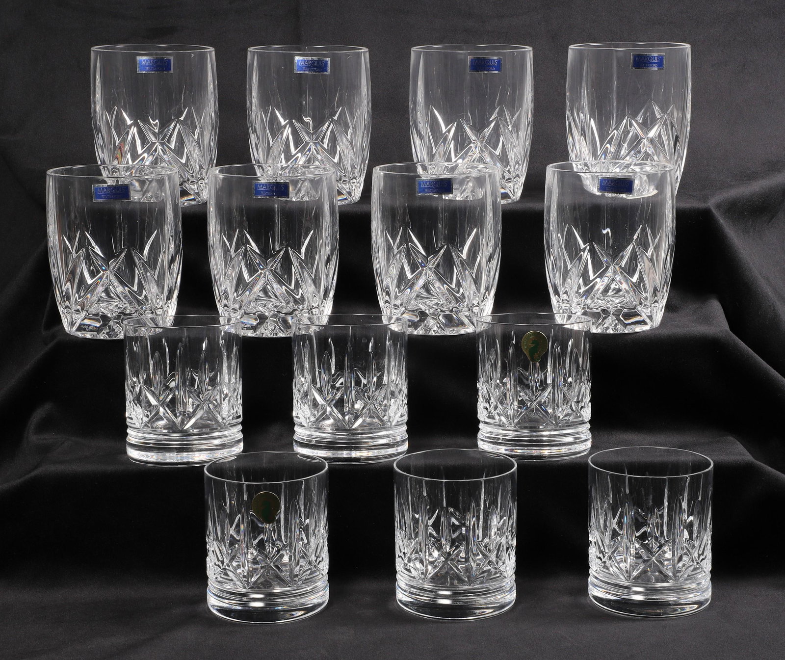 (14) Waterford Glasses: (14) Waterford glasses to include (8) Waterford Marquis NWT 4-1/2" H Brookside glasses, and (6) NWT Waterford rocks glasses, 3-1/2"H