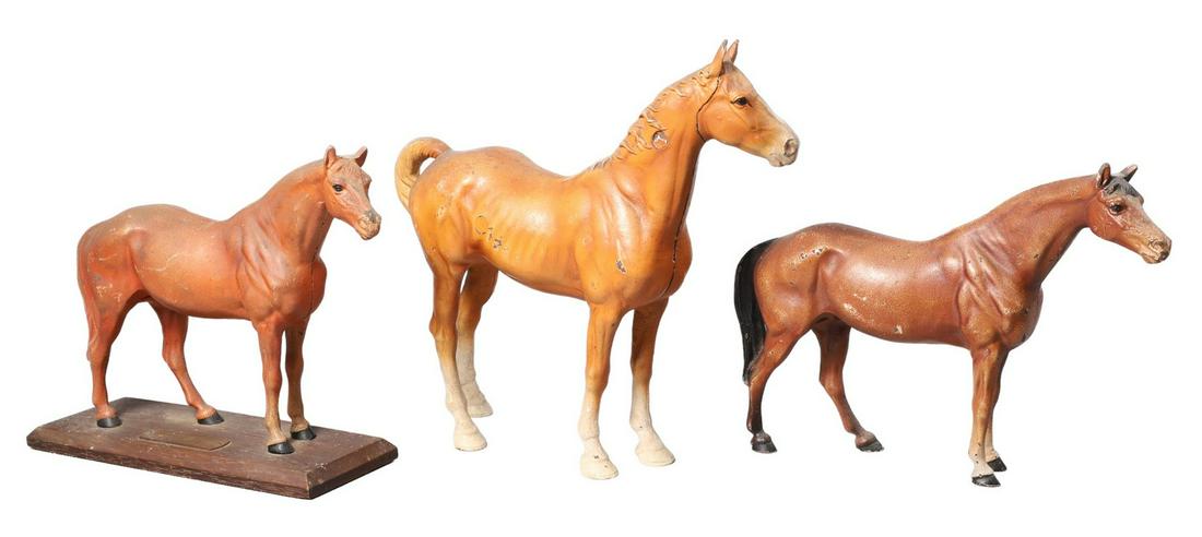 (3) Cast Iron Horse Form Doorstops: (3) Cast Iron horse form doorstops, Hubley horse, 11"L x 8"H, Hubley horse 11"L x 8"H mounted on wood plinth with plaque reading "First Place Lancaster Horse Show Spring 1945" and style, 12-1/2"L x 10