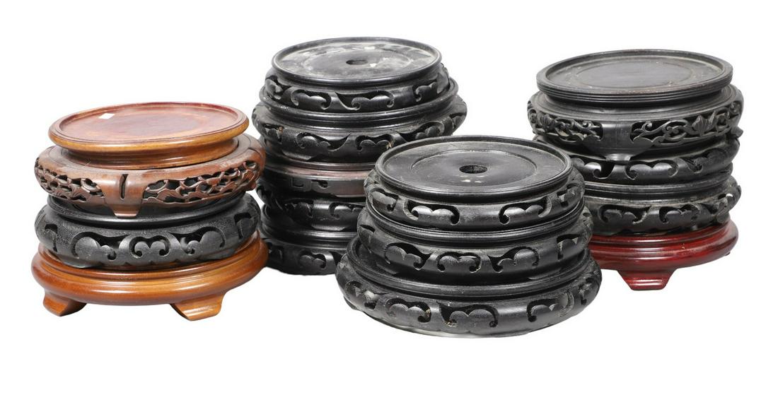 (15) Chinese Carved Wood Stands & Marble Base: (15) Chinese carved wood stands, largest 7-1/2" dia, smallest 6-1/4" dia, and 8" sq marble base