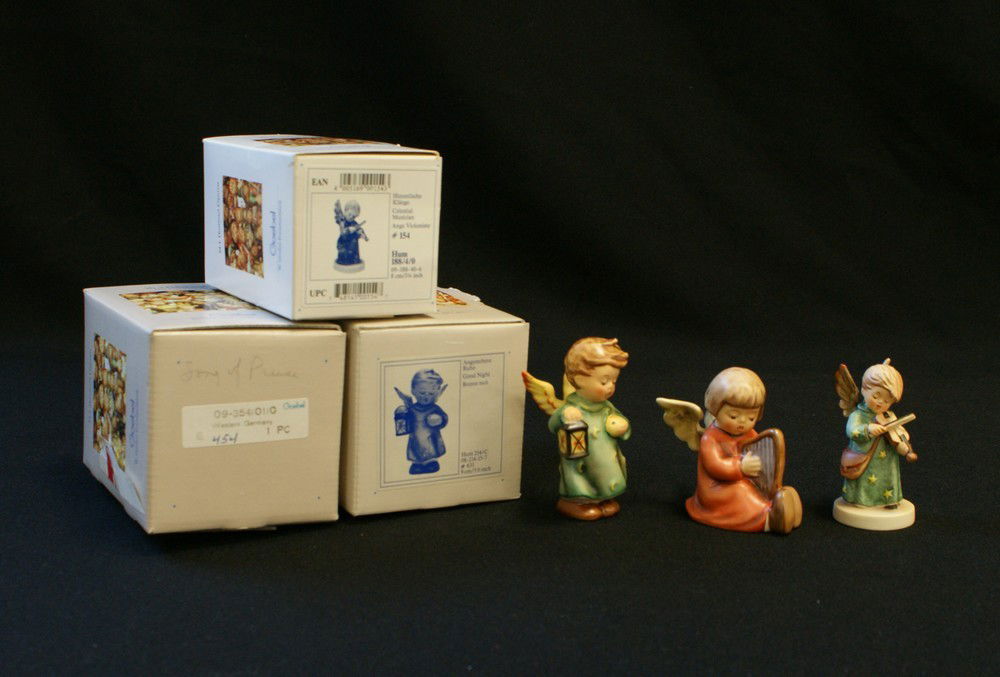 (3) Hummel Figurines, 'Celestial Musician' Hum 18: (3) Hummel Figurines, 'Celestial Musician' Hum 188/4/0 #154, 'Good Night' Hum 214/C #631, 'Song of Praise' Hum 454, tallest 3 1/2", all with original boxes