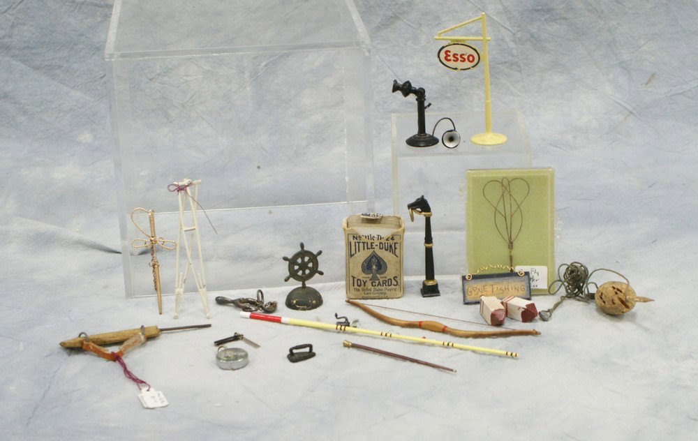 Lot of miniature accessories, including telephon: Lot of miniature accessories, including telephone, crutches, razor, Esso gas sign, fishing poles, guns, slingshot, rug beater, tallest 3"