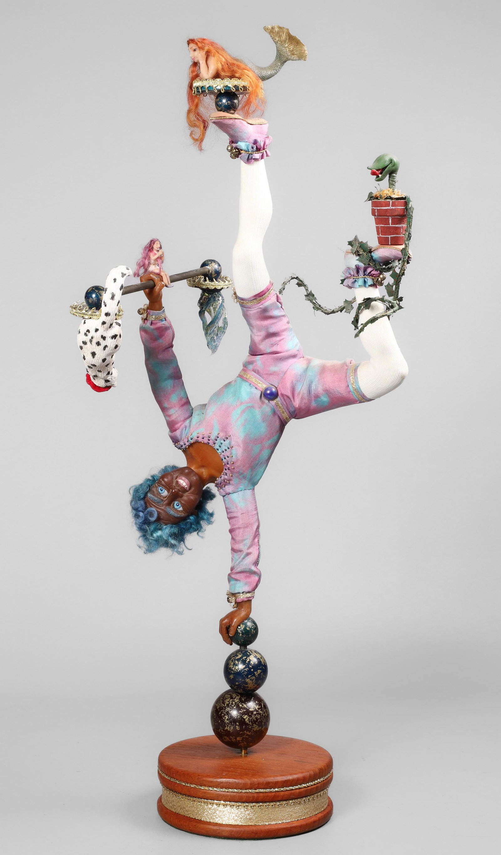 Linda Hammons Clown Sculpture "Moderation": Linda Hammons clown sculpture, 1999, "All Things in Moderation" portrays a comic fellow who appears to be handling everything with grace and ease even though he is obviously burning the candle at both