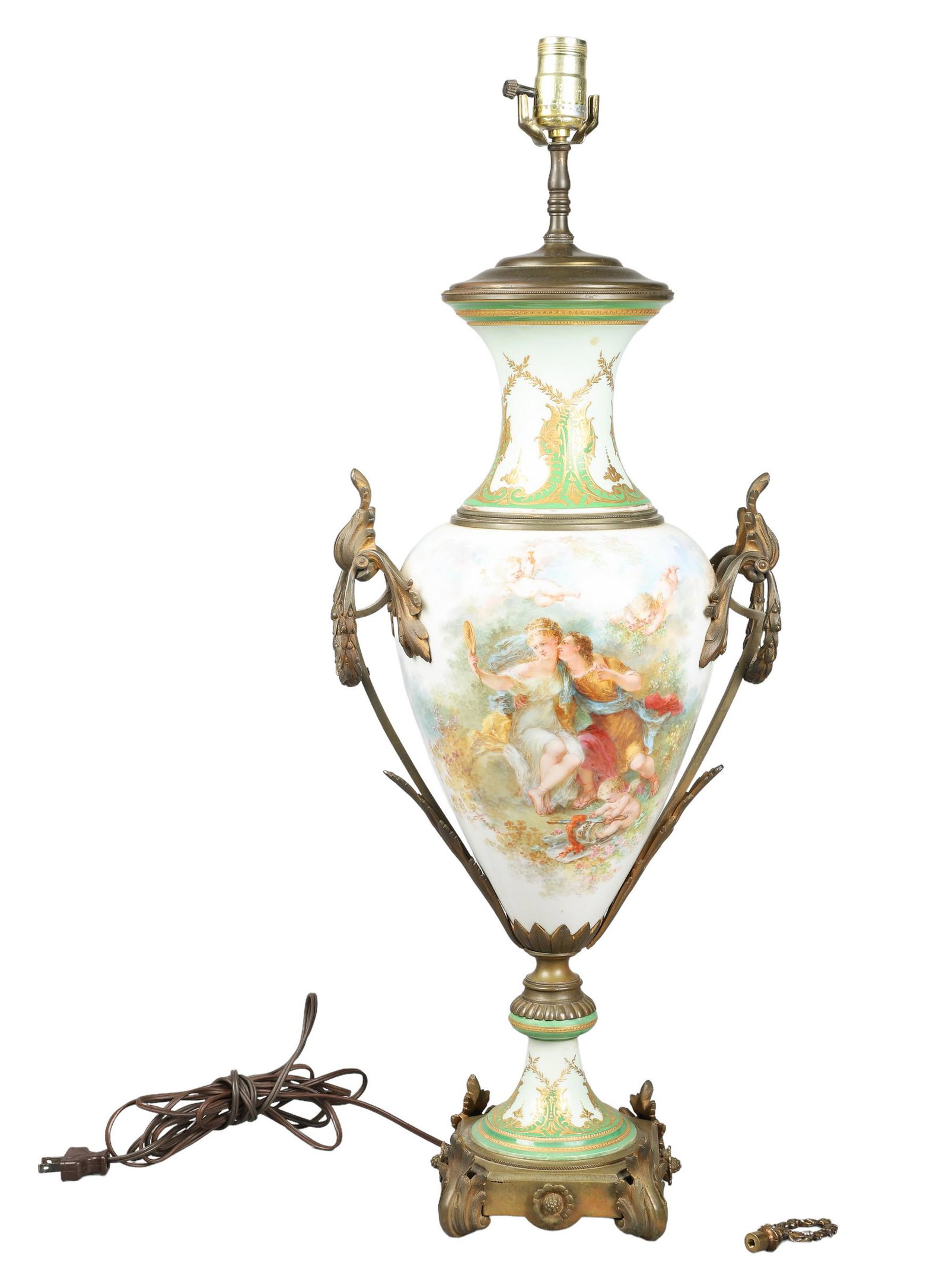 Sevres Porcelain Urn, G Fuchs Artist,19th c: Sevres Porcelain Urn, G Fuchs Artist, romantic courting scene with cherubs, obverse with cherub standing in a garden trellis, bronze mounts, artist signed, no damage noted, mounted a a lamp, not taken