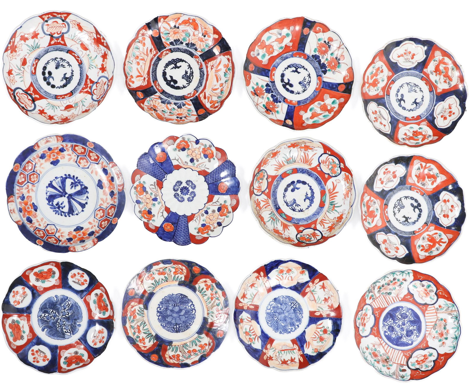 (12) Japanese Imari Porcelain Plates: (12) Japanese Imari porcelain plates, unmarked, 8-3/8"-9" dia
