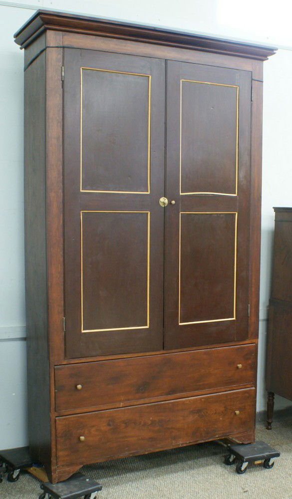 White pine wardrobe with 2 paneled doors over 2 f: White pine wardrobe with 2 paneled doors over 2 full length drawers, interior fitted later with 6 adjustable shelves, probably New England mid 19th century, 88" tall, 48" wide, 16" deep