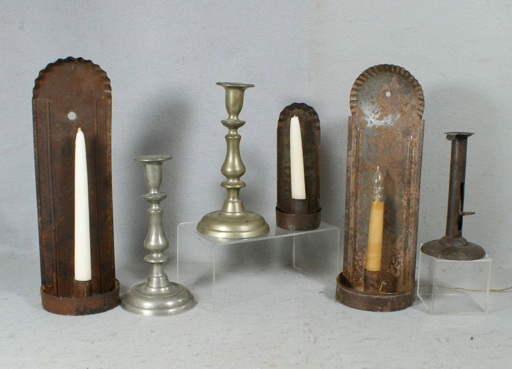 Lot early tin & pewter lighting c/o pr pushup pew: Lot early tin & pewter lighting c/o pr pushup pewter candlesticks, 8 1/2", 3 tin sconces, tallest 14", tin hogscaper candlestick