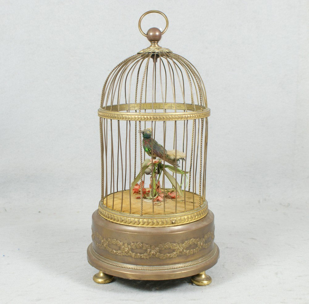 French musical bird cage, articulated head and ta: French musical bird cage, articulated head and tail, plays well, 11" tall, head & tail feathers a little worn