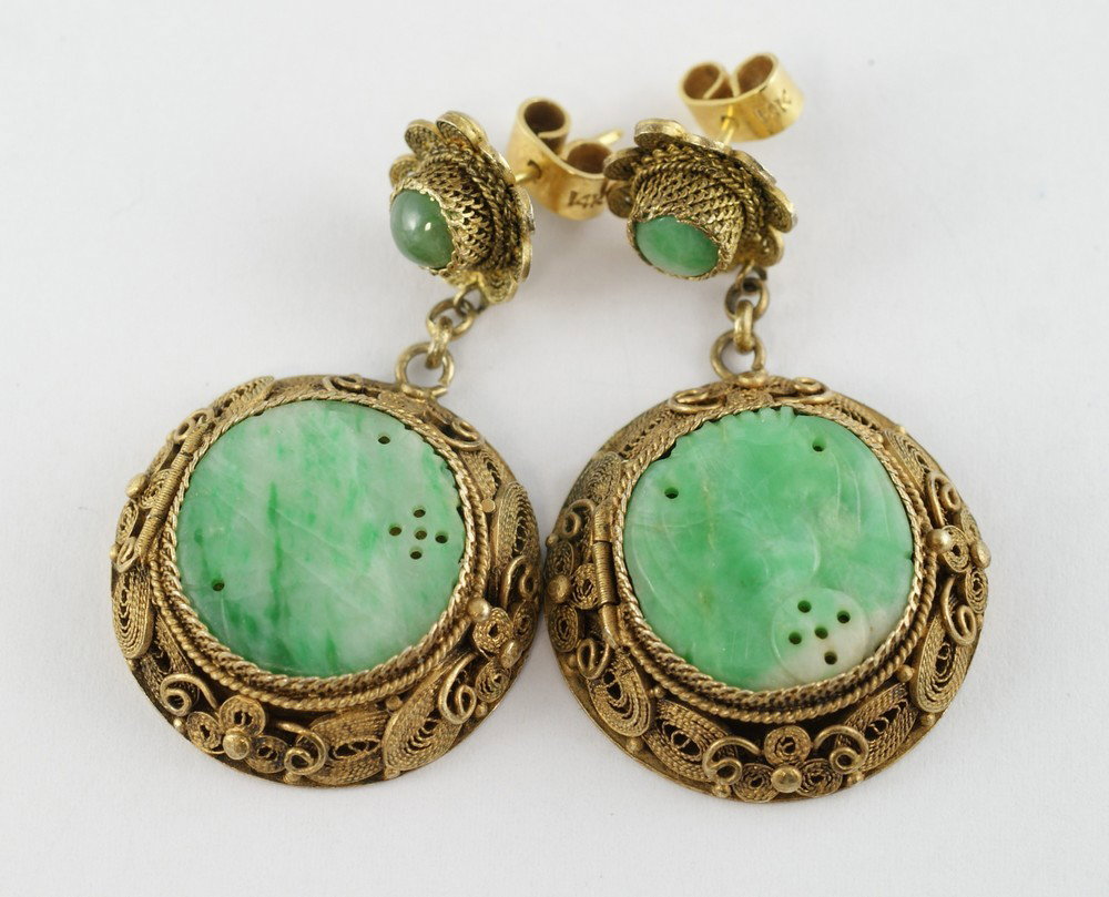 Pr gilt filigree silver carved jade disc earrings: Pr gilt filigree silver carved jade disc earrings, each opening as a locket, 1 5/8" h, 1" d