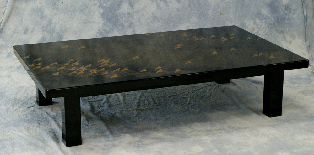 Black lacquer Japanese coffee table, artist signe: Black lacquer Japanese coffee table, artist signed, with manufacture tag on base, 35 3 /8" x 59 x 13 3/4" high