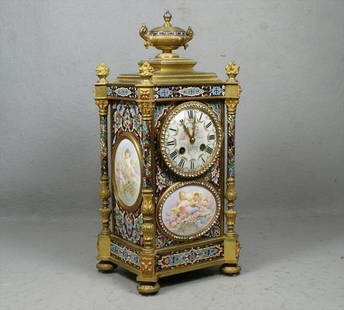 Gilt bronze, champleve, and Sevres porcelain clo: L Marti gilt bronze, champleve, and Sevres porcelain French mantle clock, rhinestone encrusted dial and front panel, dial marked Shreve, Crump, & Low, Boston, 16 1/2" tall, good running condition,