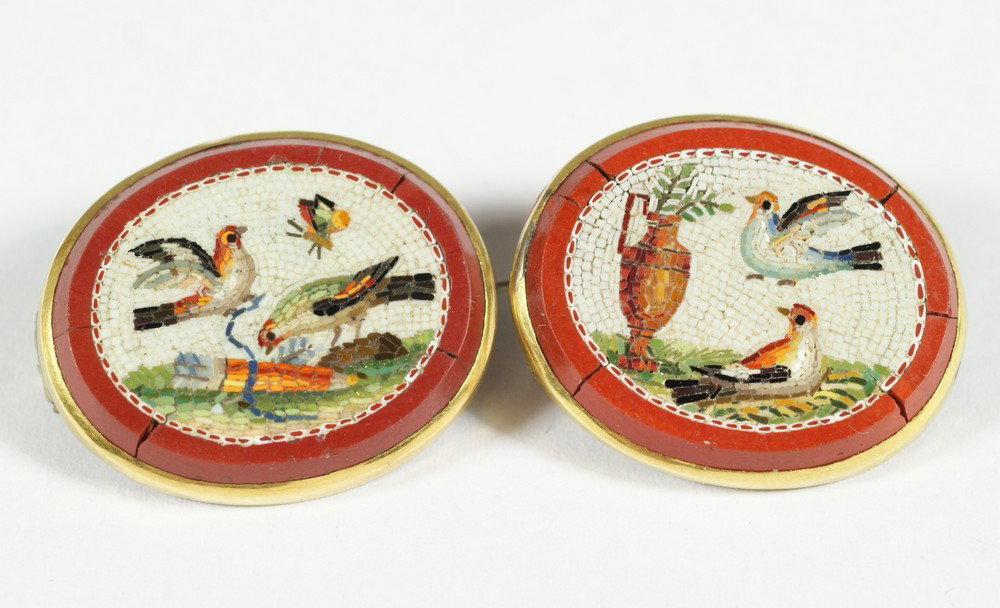 (2) Italian micromosaic pins, each with 2 birds,: (2) Italian micromosaic pins, each with 2 birds, one a quiver of arrows and butterfly, the other with a ewer, one lacking the pin back and part of the stone backing, 1" x 3/4", set in YG bezels