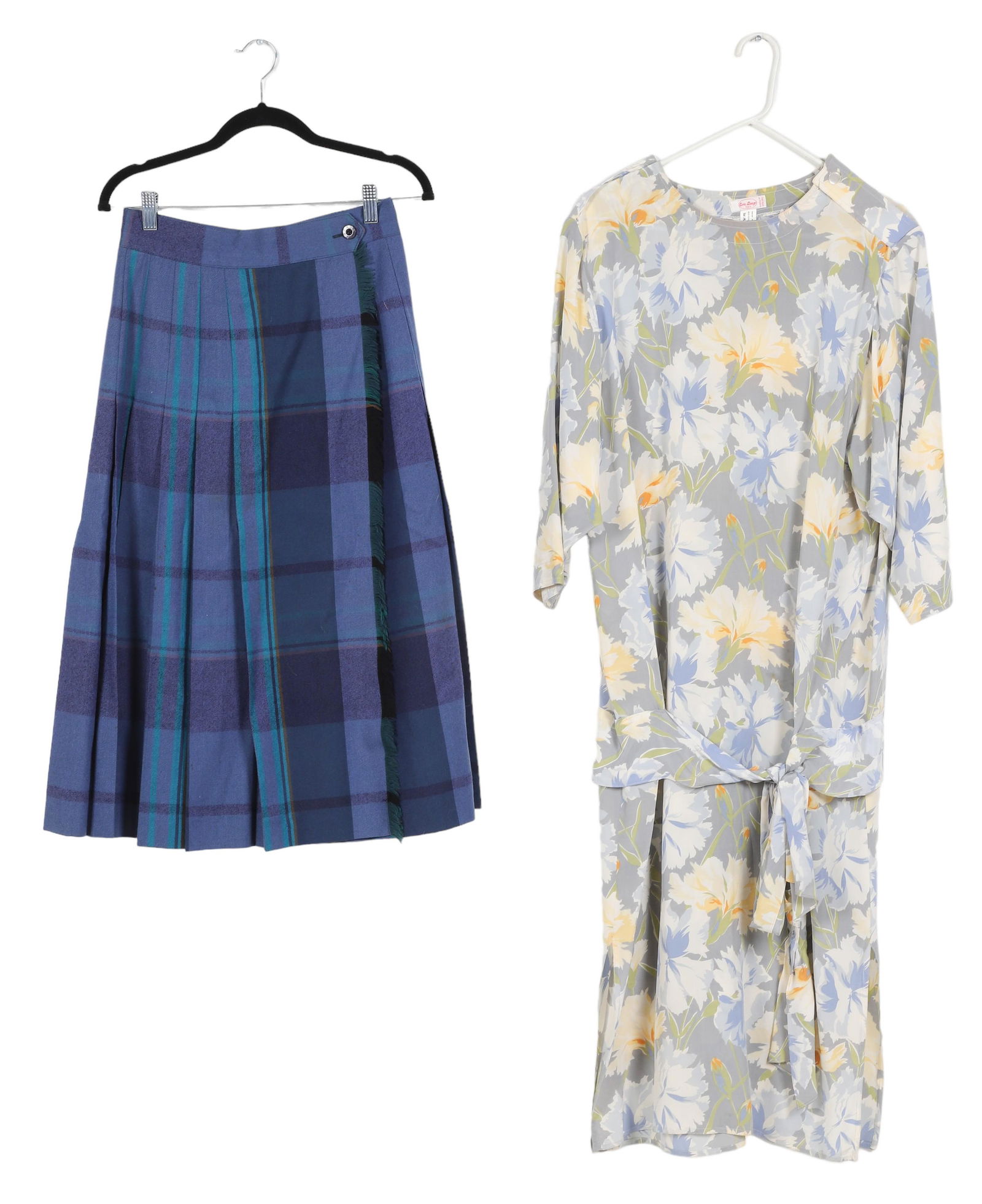 (2) Vintage Designer Dress and Skirt: (2) Vintage designer dress and skirt to include plaid fringe Escada wool skirt, made in West Germany, sz 36, 26" waist and all silk Eric Laage Paris 20's style drop waist floral dress, very good condi