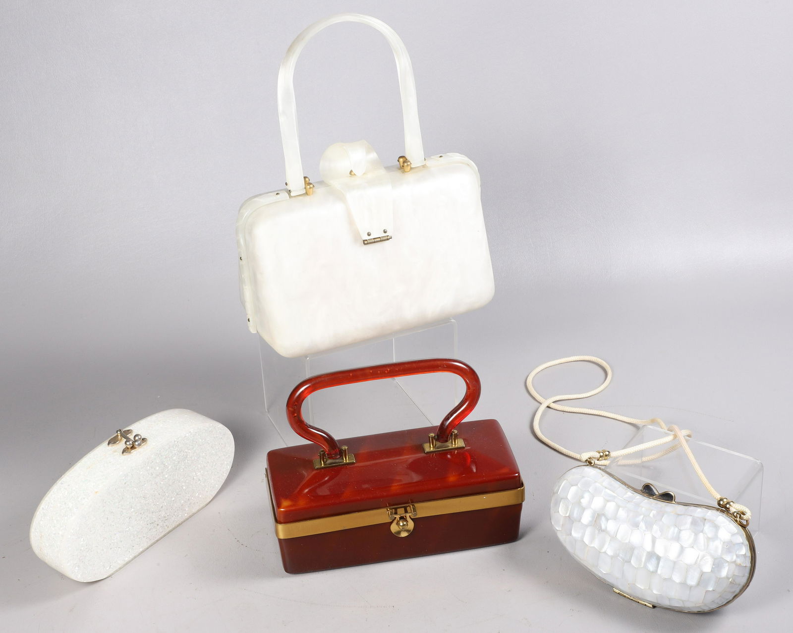 (4) Mid Century Lucite Purses Mar 28, 2023 William Bunch Auctions & Appraisals in PA