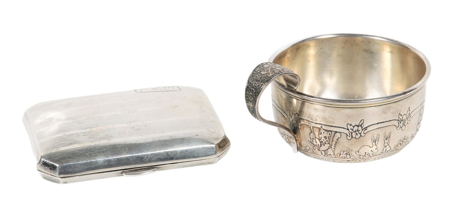 Sterling Cigarette Case and Childs Mug: Sterling cigarette case and childs mug, sterling cut corner monogrammed cigarette case,3-1/8" x 2-3/8", and storybook childs cup with scenes from cat and the fiddle, humpty dumpty, mr. stork and more,