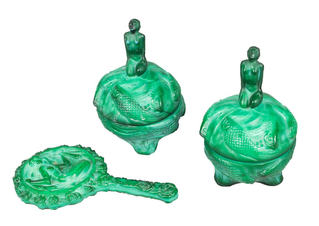 Czech malachite glass powder box pair and mirror: Czech malachite glass powder box pair and mirror to include footed koi, bubble and water swirl decorated nude maiden topped powder or trinket boxes, 6-1/2"H, unsigned with similarly designed maiden an