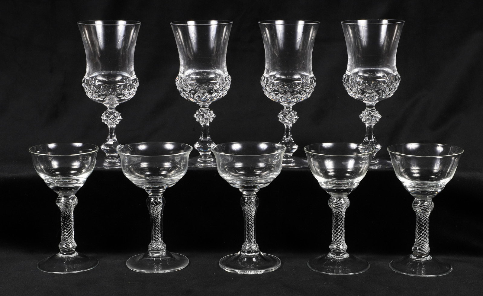 (9) Crystal Wine Glasses: (9) Crystal wine glasses, c/o (5) Foreign Advisory Crystal Colonial Williamsburg Air Twist stems pattern (5-7/8" h), Cristal Sevres France thistle form (7-1/4" h)