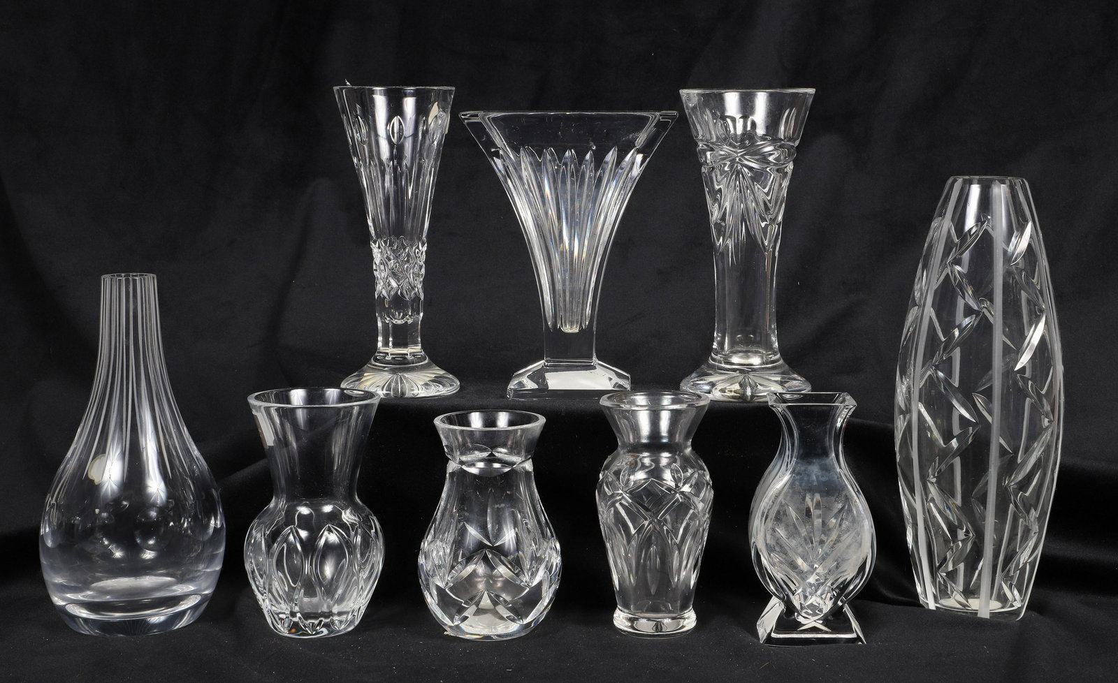 (9) Waterford Crystal Vases: (9) Waterford crystal bud vases, c/o Antares (9" h), Athens posy (4-3/4" h), Zephyr posy (4-1/4" h), Clarion (6" h), Happy Anniversary stem (6-3/8" h), Happy Birthday stem (6-1/2" h), Monique Lhuillie