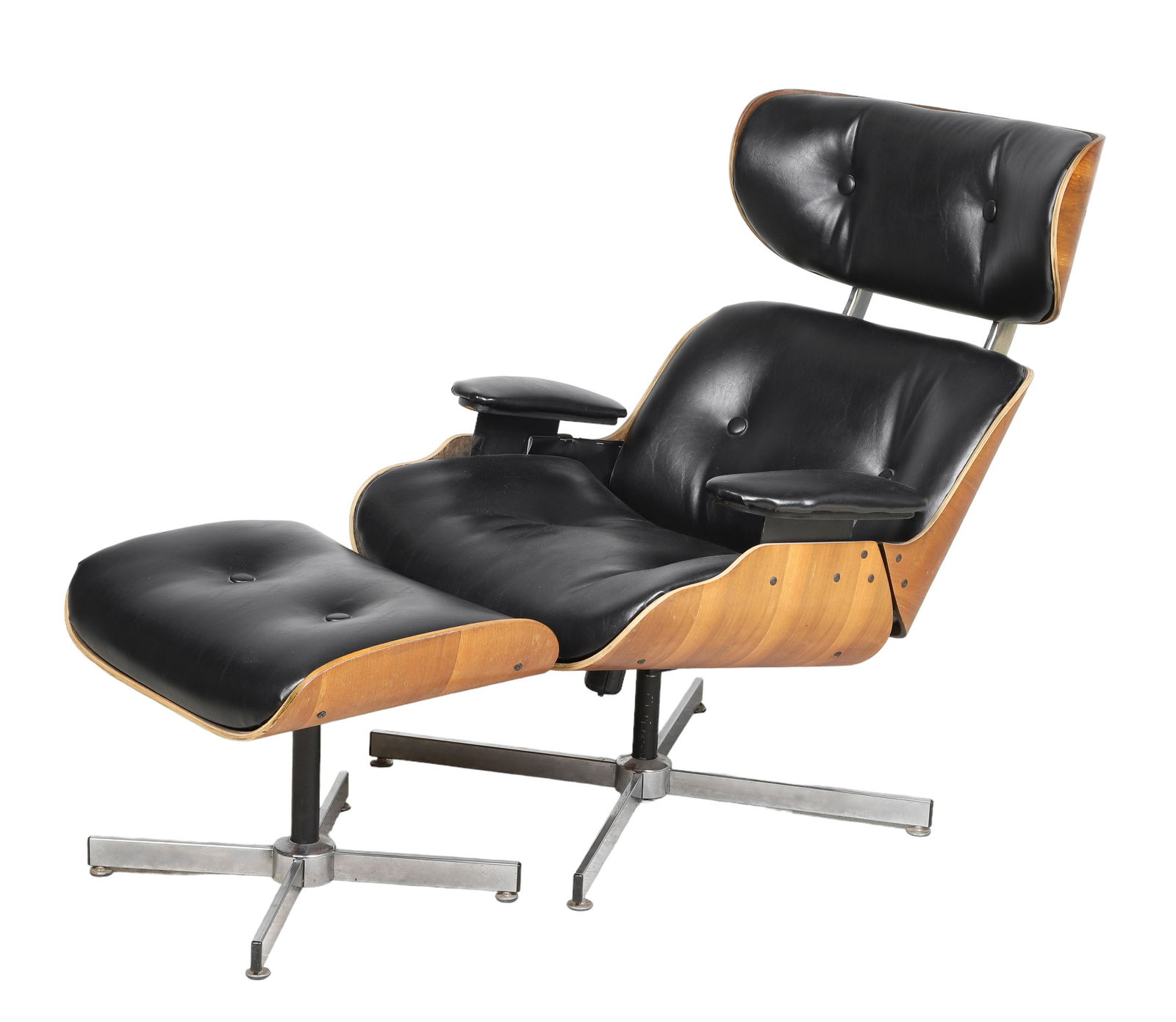 Selig Eames style lounge chair and ottoman: Selig Eames style lounge chair and ottoman, ebonized tufted leather, walnut back, chrome base, 37"h x 25"w x 26"d, repair to bottom on base of back