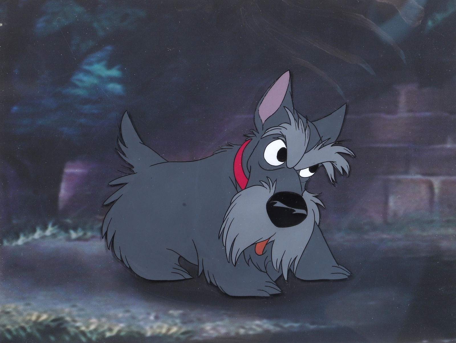 Lady and the Tramp Production Cel: Lady and the Tramp production cel depicting a riled up Jock, from Walt Disney's Lady and the Tramp, hand inked and hand painted on celluloid with facsimile background, Walt Disney Productions label on