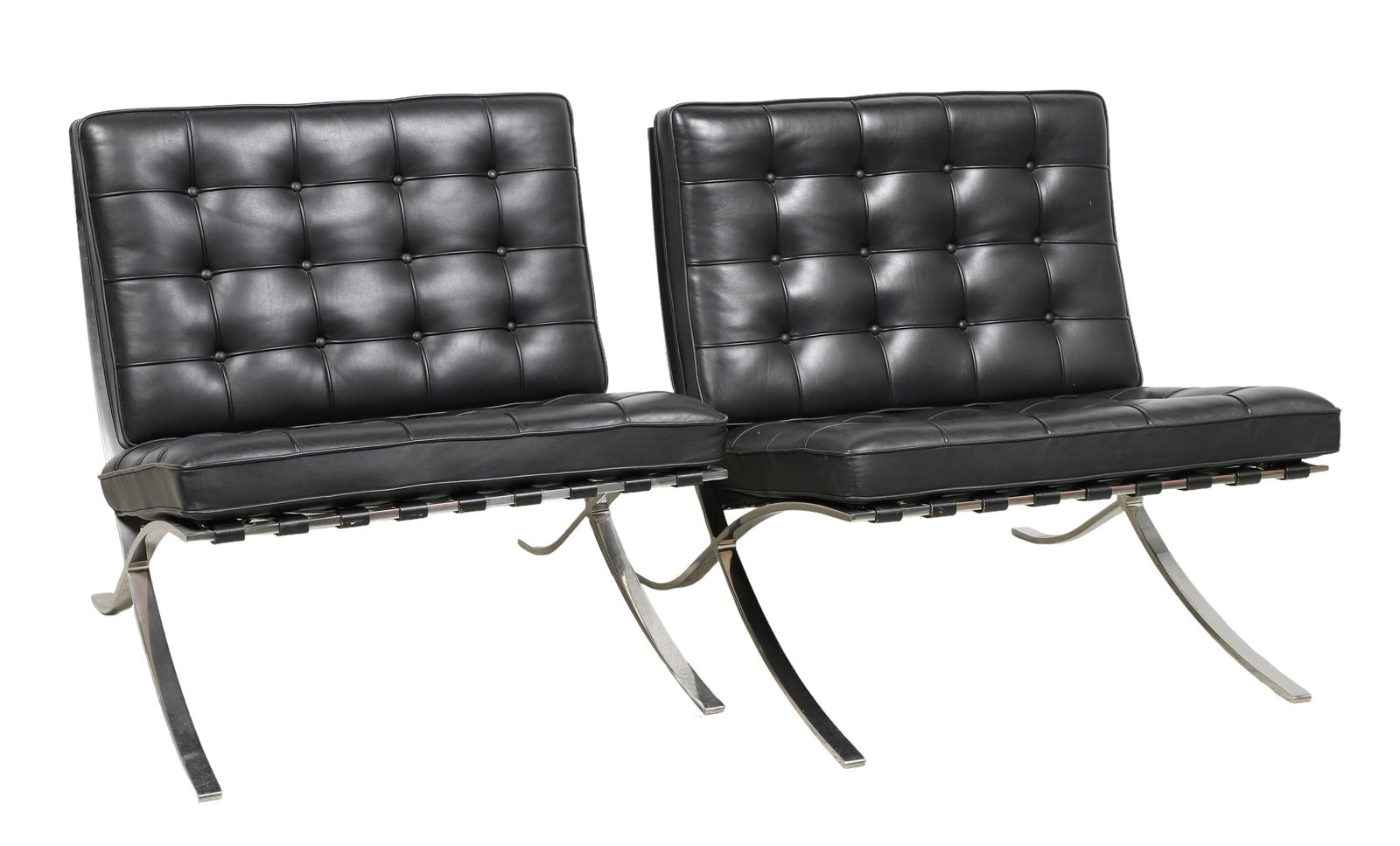 Pair Mies Van Der Rohe for Knoll Barcelona chairs: Pair Mies Van Der Rohe for Knoll Barcelona chairs, chrome frames, black tufted leather cushions, Knoll tag on base, 31"h x 29"w