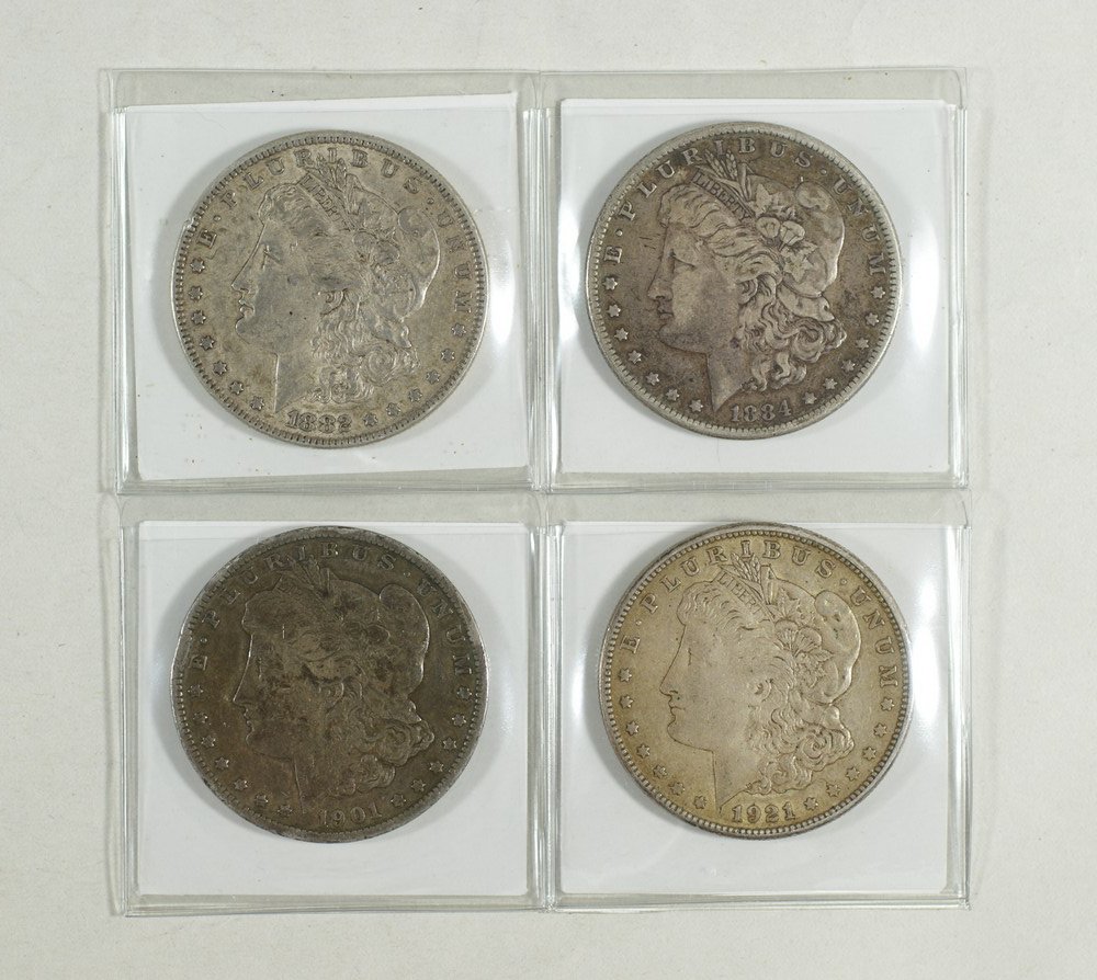4 different Morgan dollars good to very fine 1882: 4 different Morgan dollars good to very fine 1882, 1884, 1901 and 1921's