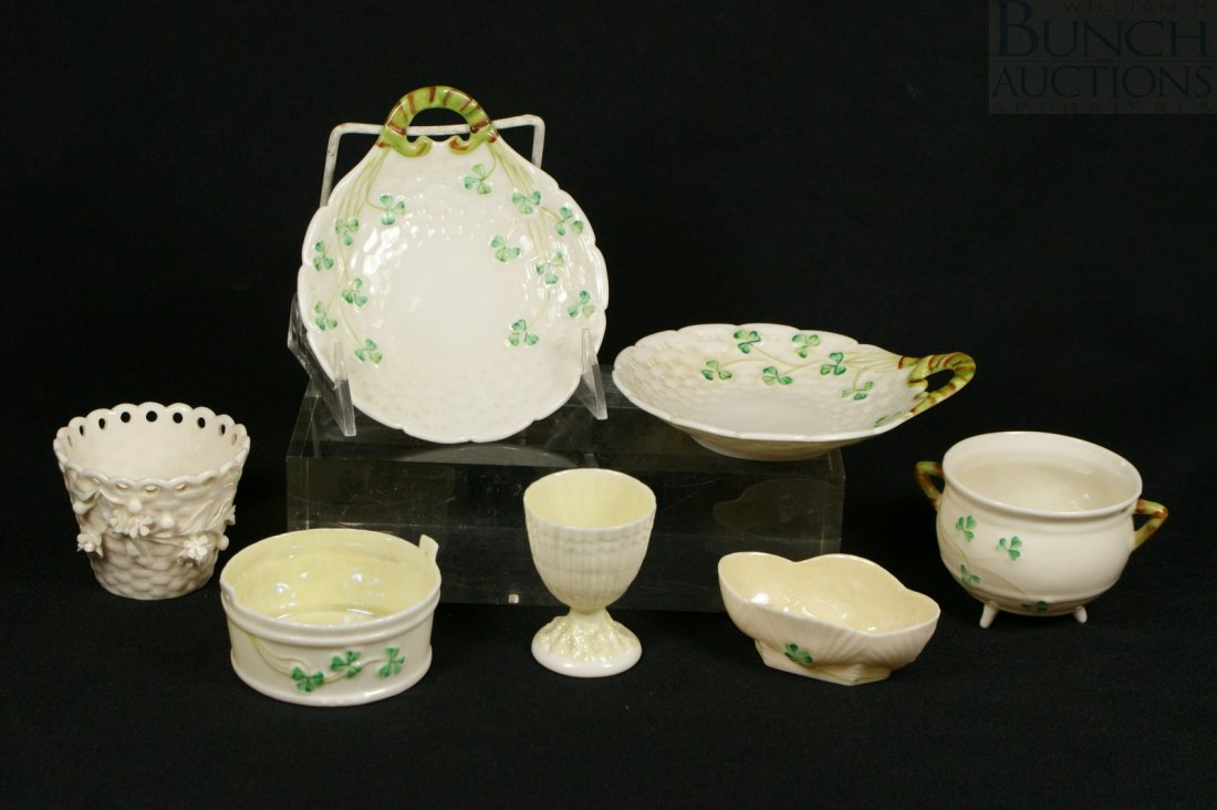 Belleek 7 pc with green mark: 2 Shamrock Basketwe: Belleek 7 pc with green mark: 2 Shamrock Basketweave Nappies, Shamrock Cauldron, Shamrock bucket, Shamrock Shell open salt, Basket w/ floral decoration and Shell pattern egg cup; largest is 5 1/2"
