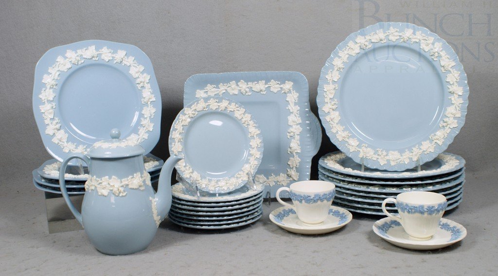 Wedgwood embossed Queensware dinnerware - 26 piec: Wedgwood embossed Queensware dinnerware - 26 pieces, including 8 dinner plates, 8 B&B plates, teapot, square cake plate, 4 square dessert plates, 2 cups & 2 saucers