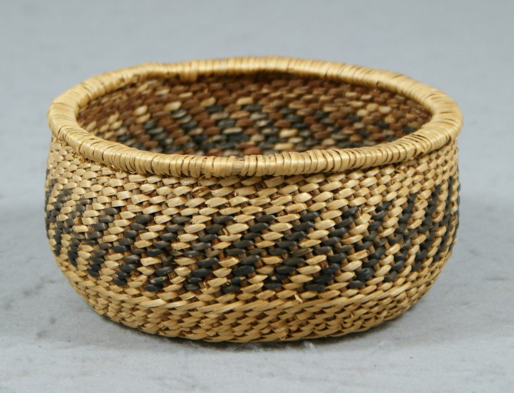 Native American woven basket with black and brown: Native American woven basket with black and brown design, 6" d