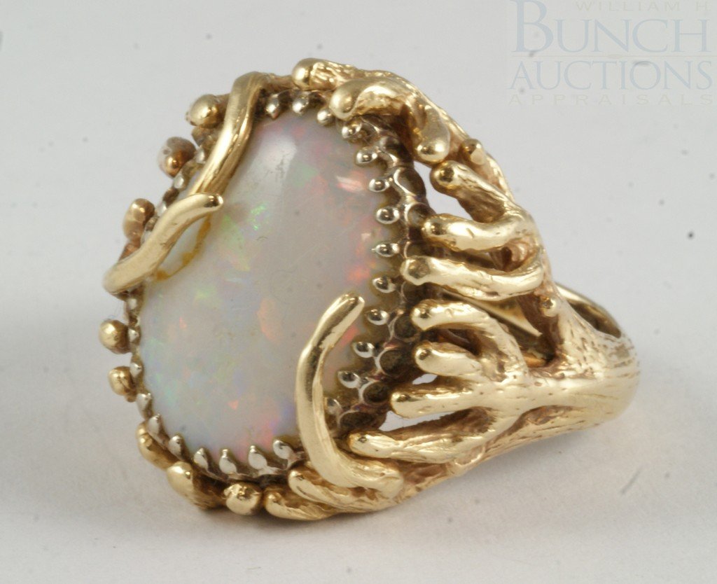 Unmarked YG opal ring, tests 14K, 22 mmx 17 mm ap: Unmarked YG opal ring, tests 14K, 22 mm x 17 mm approx size of stone, 11.2 dwt gross wt, size 8 1/2