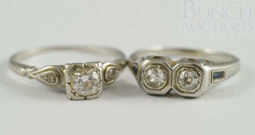 (2) 18K WG ladies diamond rings, one w/(2) 20-25: (2) 18K WG ladies diamond rings, one w/(2) 20-25 pt diamonds, the other w/50-60 pt diamond with 2 small stones, sizes 6 & 7 1/2, 3.4 dwt