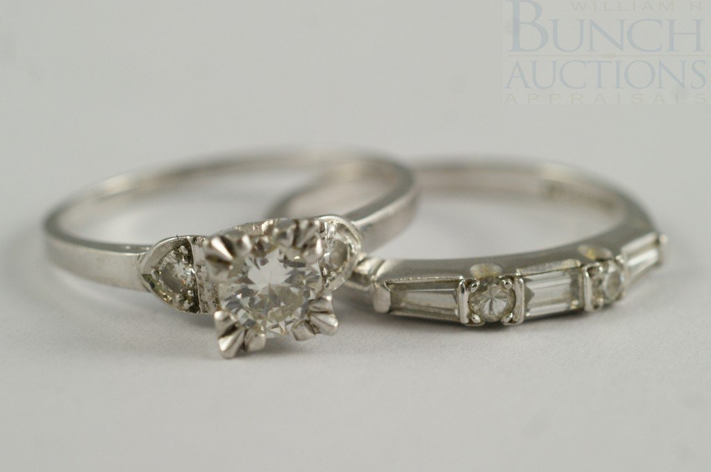 (2) platinum ladies diamond rings, one w/30-35 pt: (2) platinum ladies diamond rings, one w/30-35 pt diamond plus 2 small stones, the other with 3 baguette and 2 round diamonds, about 40-50 pts tdw, each size 6, 3.7 dwt
