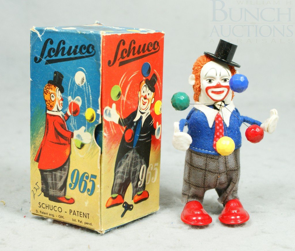 Schuco Juggling Clown, with original box, approx: Schuco Juggling Clown, with original box, approx 5" high