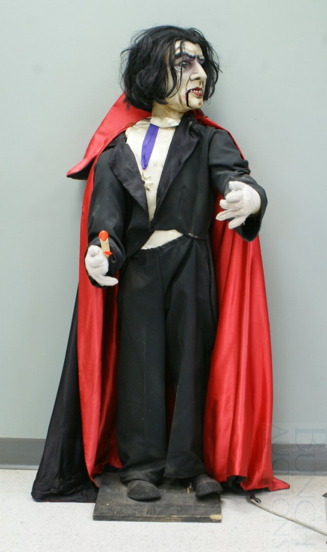 Electromechanical Dracula Halloween decoration: Electromechanical Dracula Halloween decoration, cannot get it to move, comes with a control box, 53"