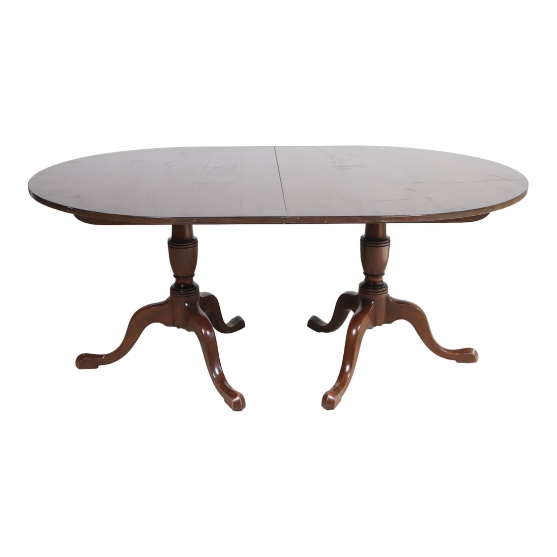 Kittinger Chippendale style double pedestal mahogany dining table: Kittinger Chippendale style double pedestal mahogany dining table, turned posts on tripod legs, 29"h x 66"w x 45"d