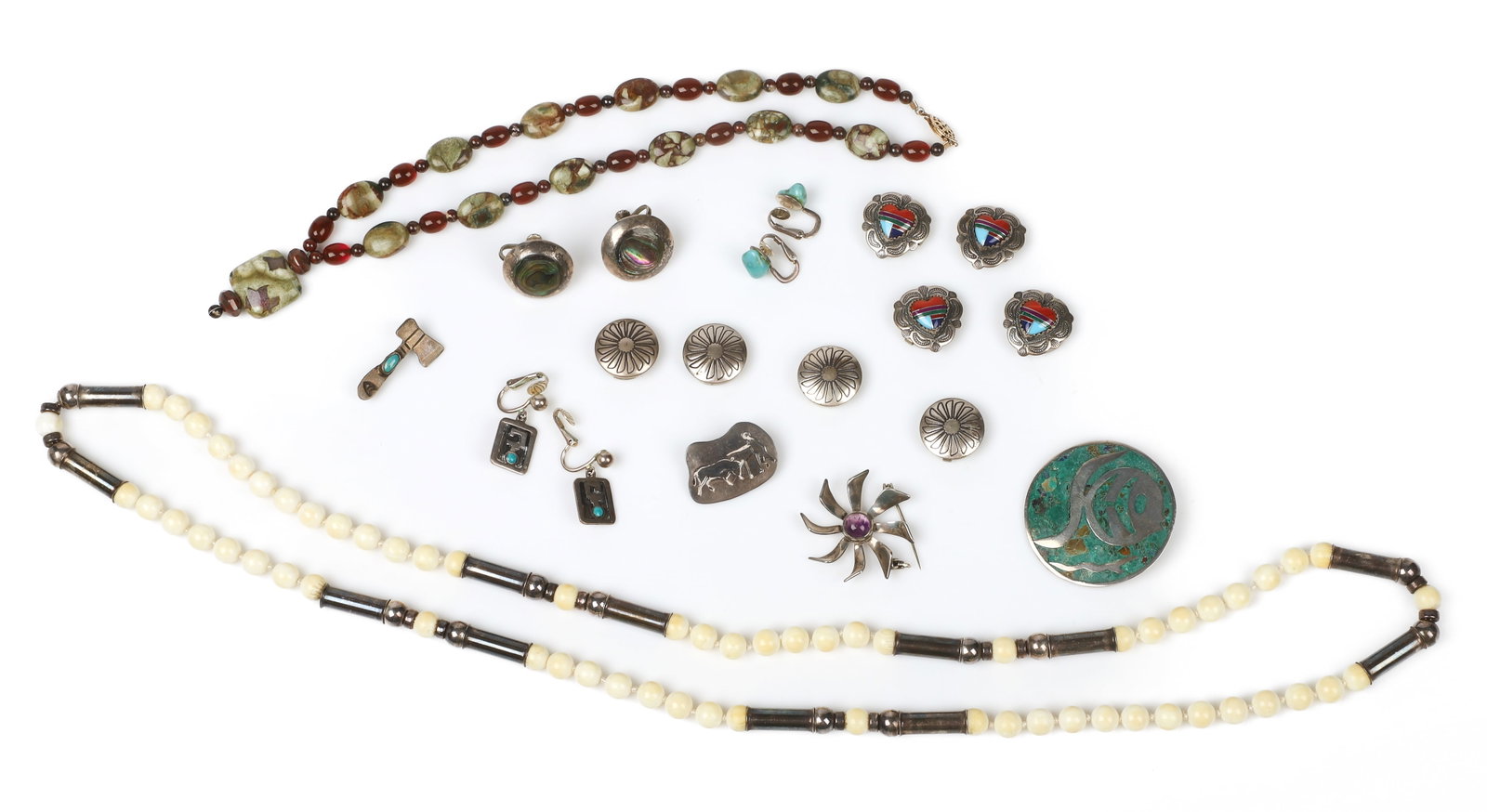 Native American and Style Sterling Jewelry Group: Native American and Style Sterling Jewelry Group to include a bone and sterling beaded necklace, a Mexican sterling floral brooch, a Mexican sterling crushed turquoise inlaid pin with a fish, a sterli