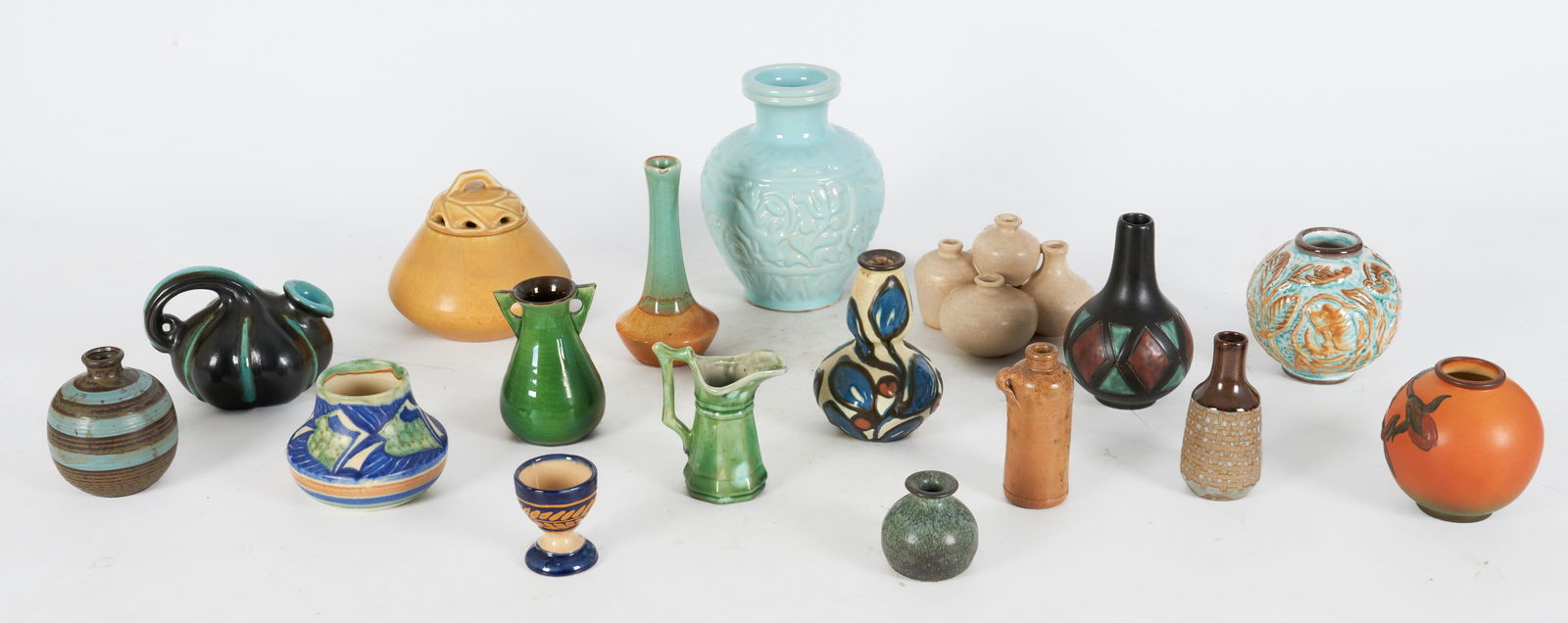 (17) Miniature Pottery Vases: (17) Miniature pottery vases to include a Quimper egg cup, a Rookwood pottery covered jar, #2337, a stoneware miniature jug, a multi-pot joined vase, an illegibly signed brown and blue glazed vase, 5