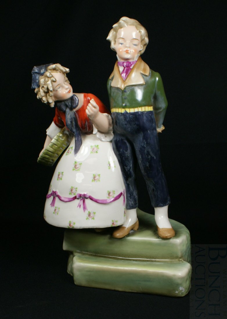 Amphora figurine of a young couple, she with a ba: Amphora figurine of a young couple, she with a basket, 16" tall ,impressed Amphora, with an impressed crown