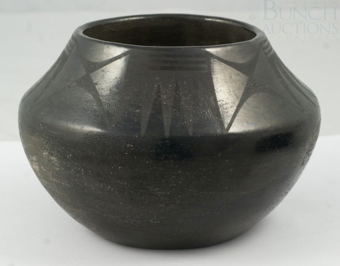 Marie Martinez, San Ildefonso, black on black po: Marie Martinez, San Ildefonso, black on black pottery bowl, abrasions and losses to glaze, 6 1/4" d, 4 1/4" h