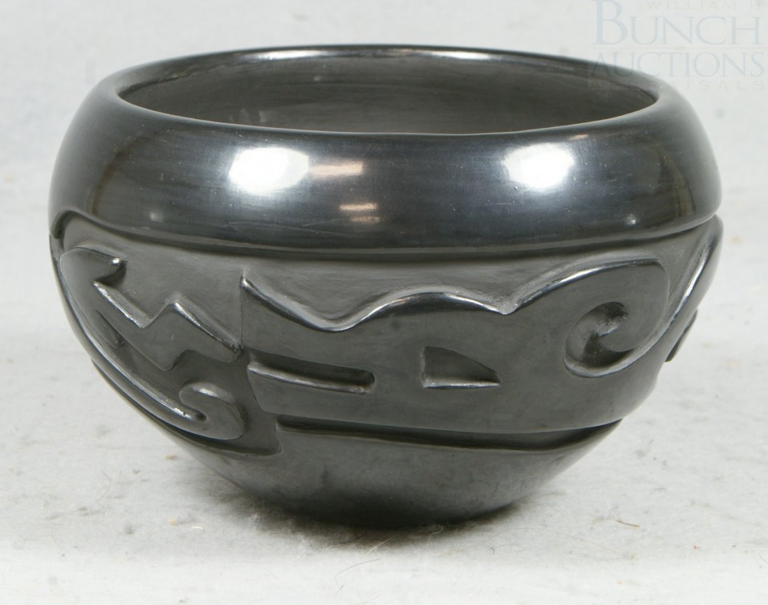 Mary Cain, Santa Clara Pueblo, b 1915, carved bla: Mary Cain, Santa Clara Pueblo, b 1915, carved black pottery bowl, serpent design, 7 1/2" d, 4 5/8" h, no damage noted