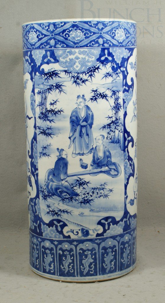 Blue and white Japanese porcelain umbrella stand,: Blue and white Japanese porcelain umbrella stand, 24 1/2" h, 4 panels of immortals/floral decoration