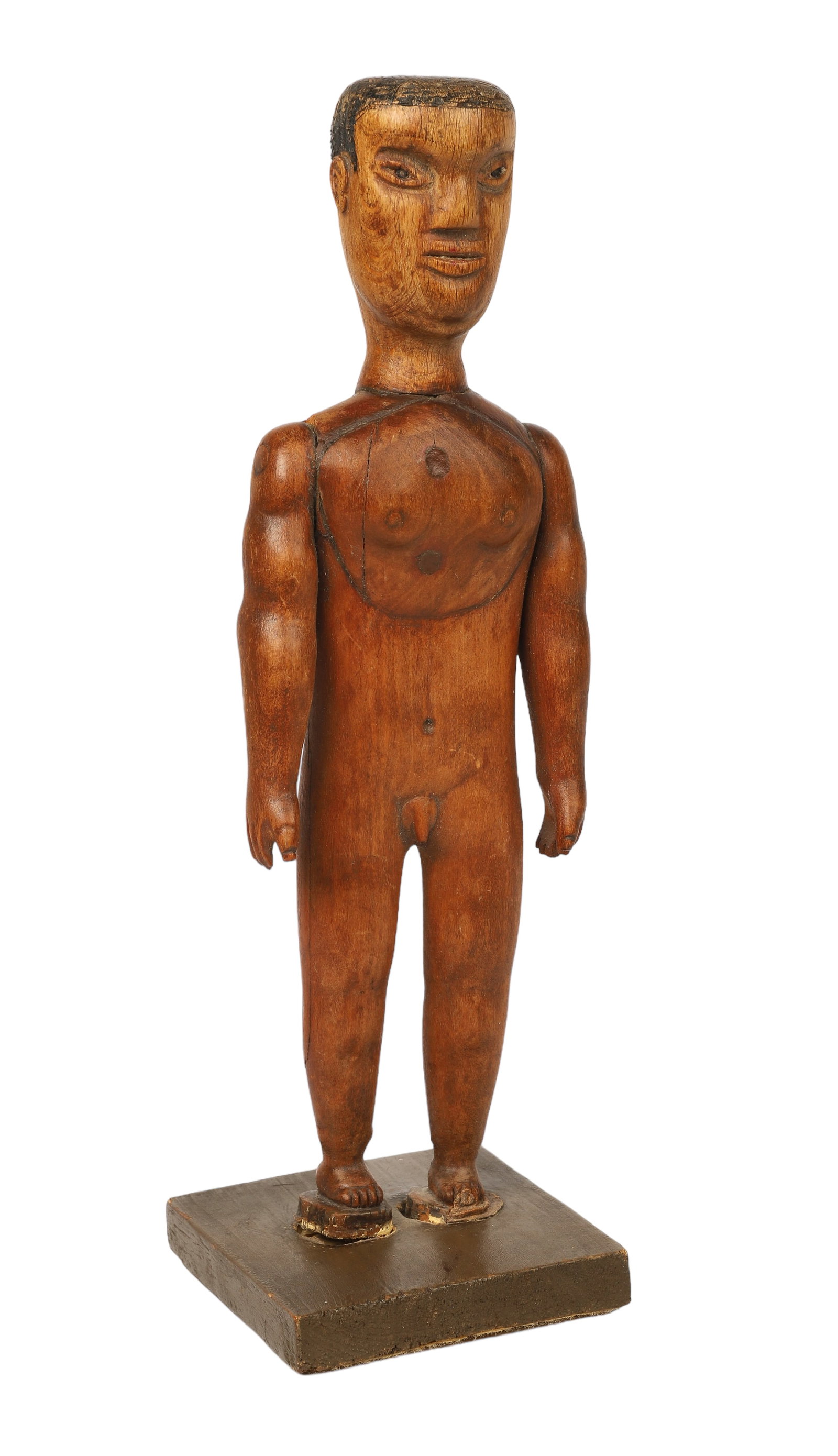 Primitive Carved Wood Nude Male Figure: Primitive carved wood nude male figure, unmarked, 12" h, no damage to fingers, crack to body in the back, chip at top of left shoulder on the body, age split to left side of chest, age split to back o