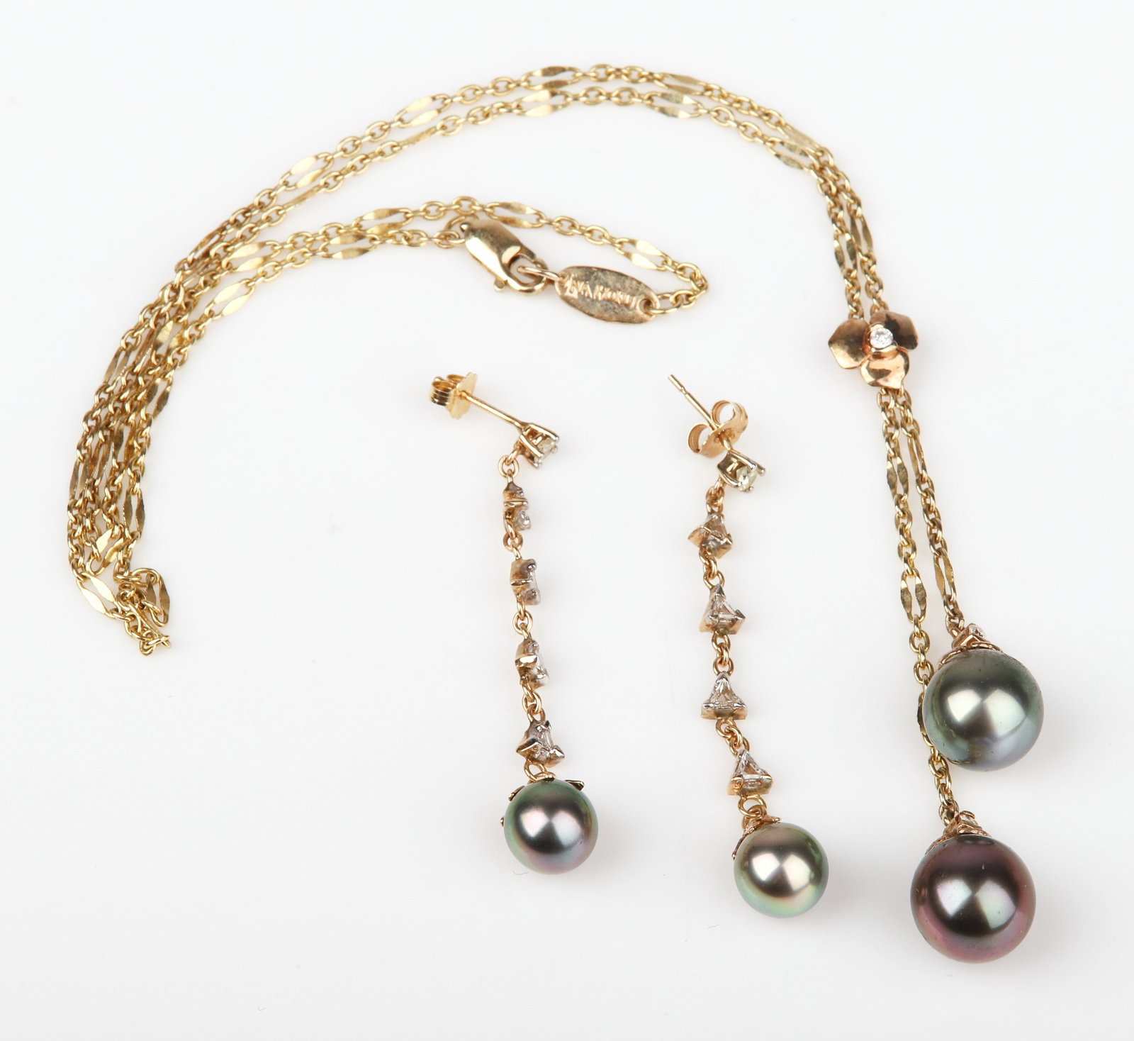 14K Diamond and Pearl Necklace and Earrings: 14K Diamond and pearl necklace and earrings to include a 14K yellow gold Na Hoku lariat style necklace with (2) grey pearls suspended, diamond highlight, 19"L, along with a pair of similarly designed 