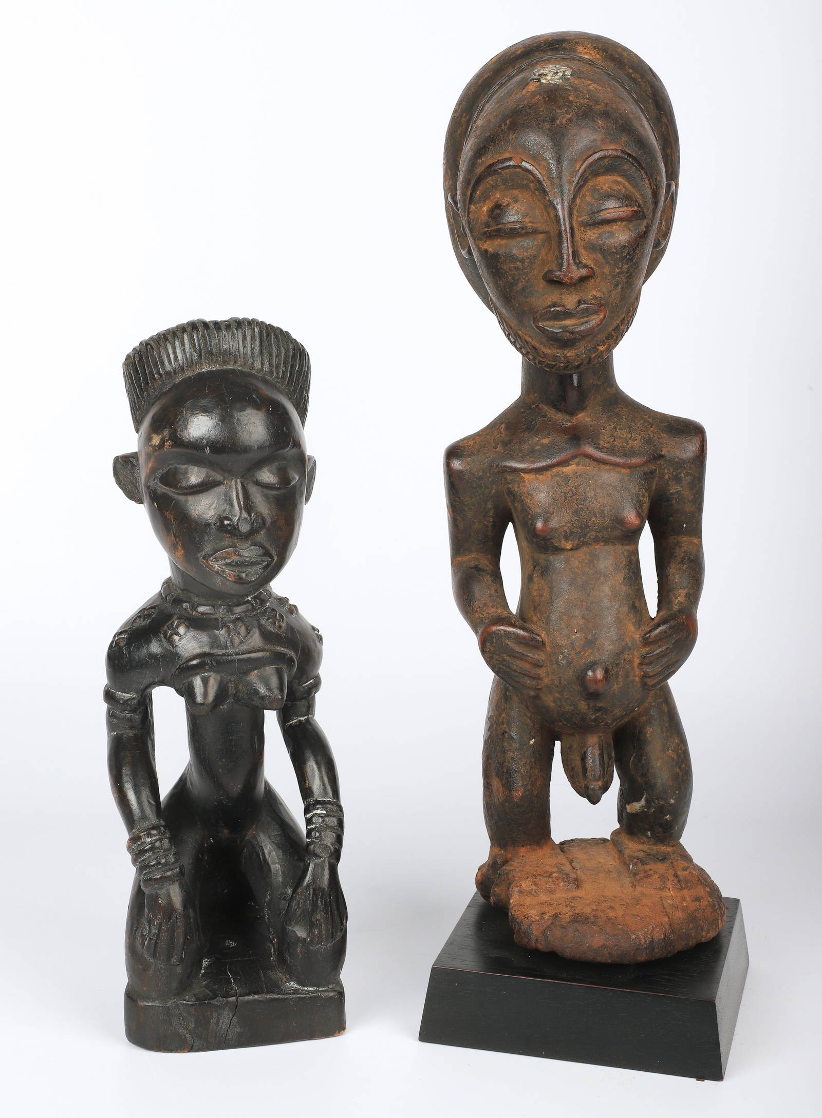 (2) African Carved Wood Fertility Statues Auction