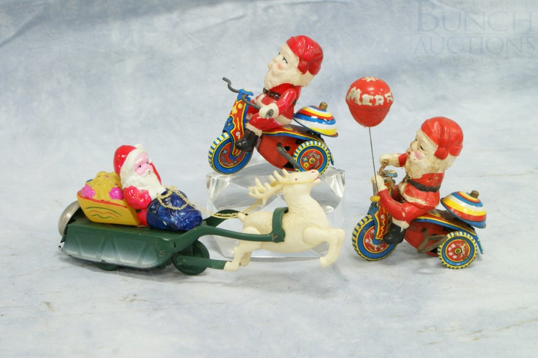 (3) Santa tin litho & plastic wind-up toys, one m: (3) Santa tin litho & plastic wind-up toys, one missing key, 2 Suzuki TS753 in working condition, one missing balloon, one with arms detached, longest 8"