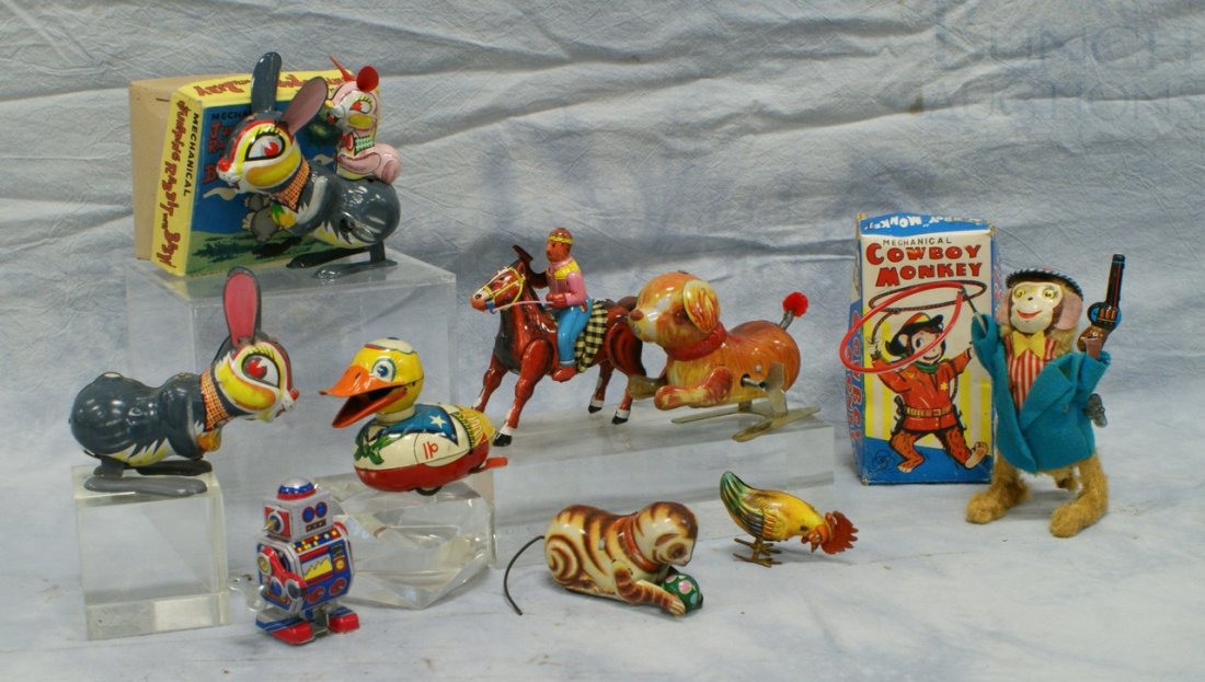 (9) Wind-up tin litho toys, 2 with original boxes: (9) Wind-up tin litho toys, 2 with original boxes, tallest 6 1/2"
