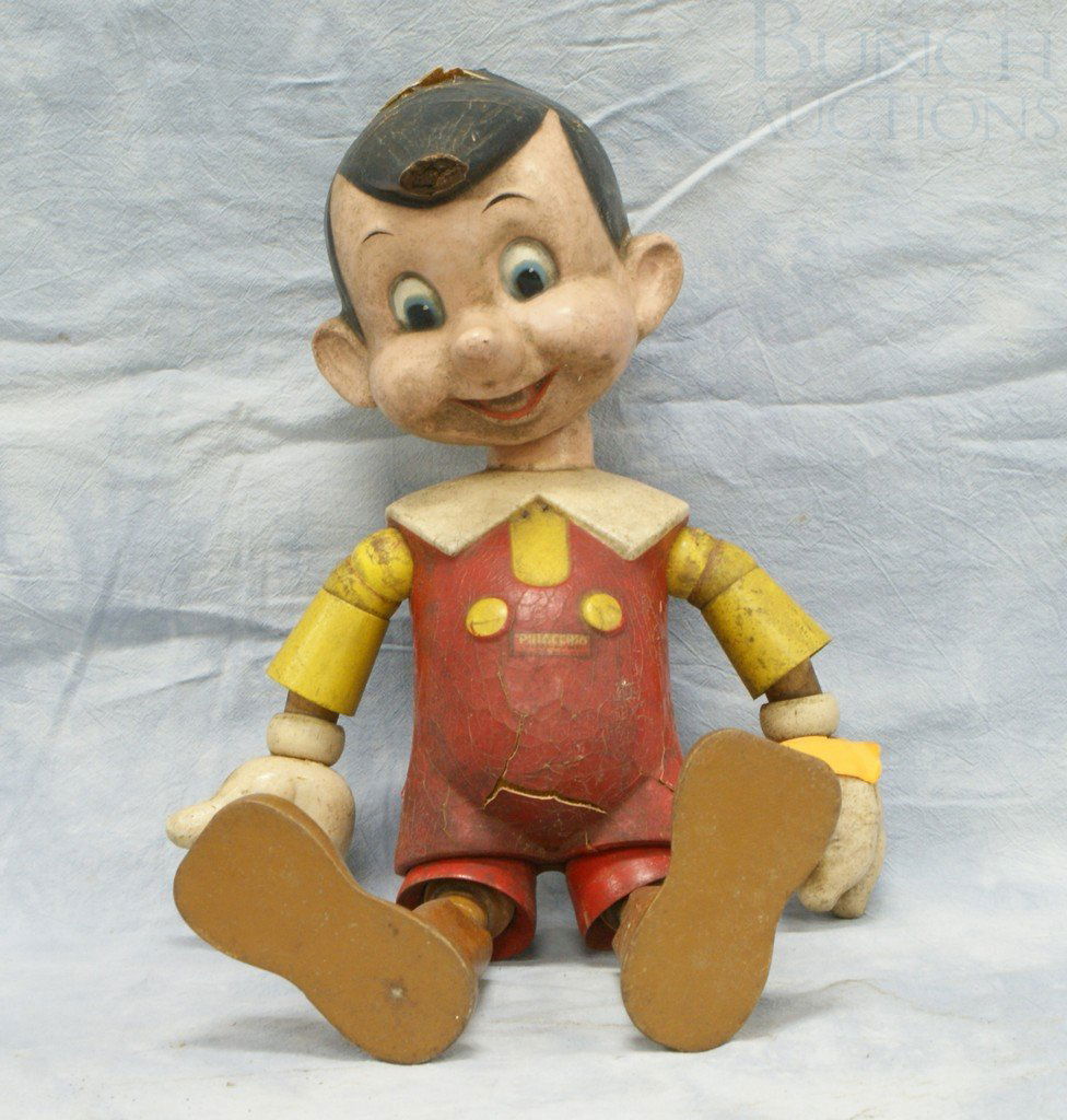 Ideal composition over wood Walt Disney's Pinocc: Ideal composition over wood Walt Disney's Pinocchio, articulated, missing tip of hair, some composition loss, 20" tall