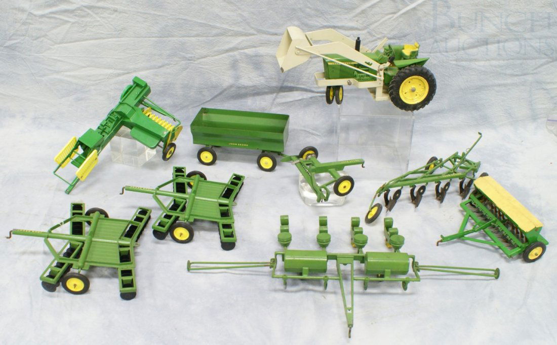 (9) pcs of John Deere Die Cast Metal Toys includi: (9) pcs of John Deere Die Cast Metal Toys including one Tractor and accessories, largest 5-1/2" high